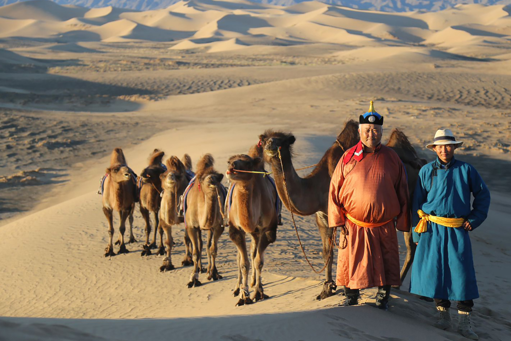 Camel back riding in Khongor Sand Dune